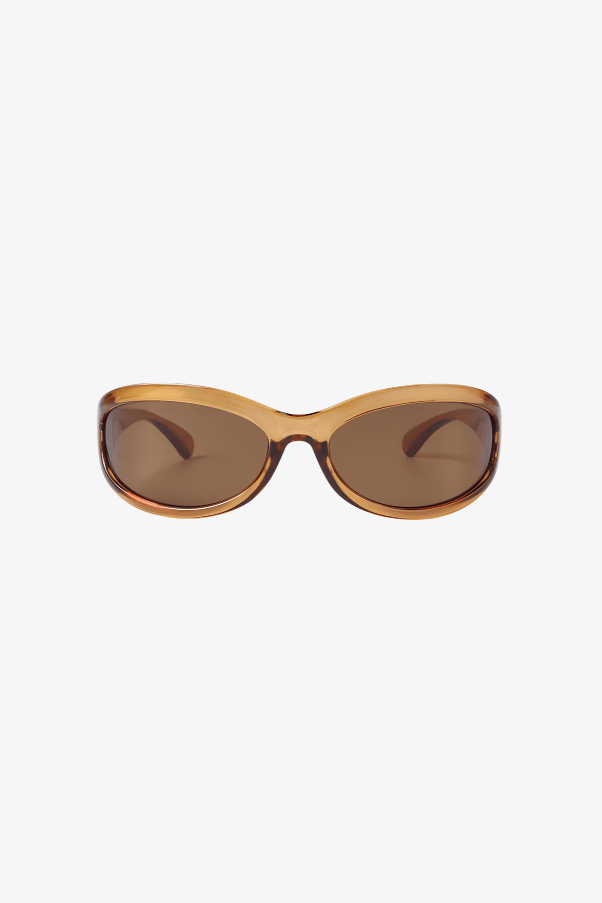Oversized sunglasses with a translucent amber-brown frame and matching brown lenses, shown against a plain light gray background.