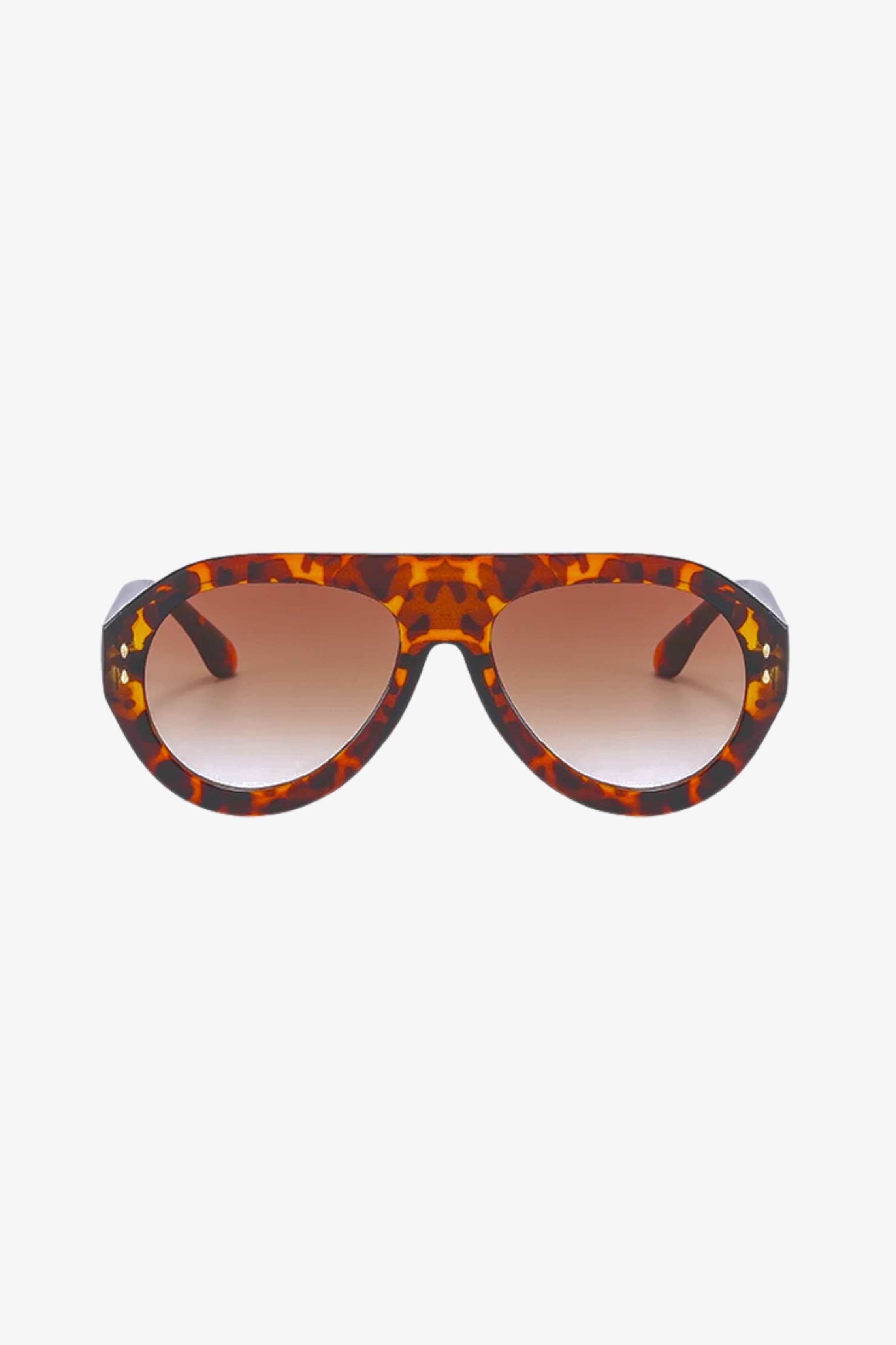 Tortoiseshell sunglasses with a white background