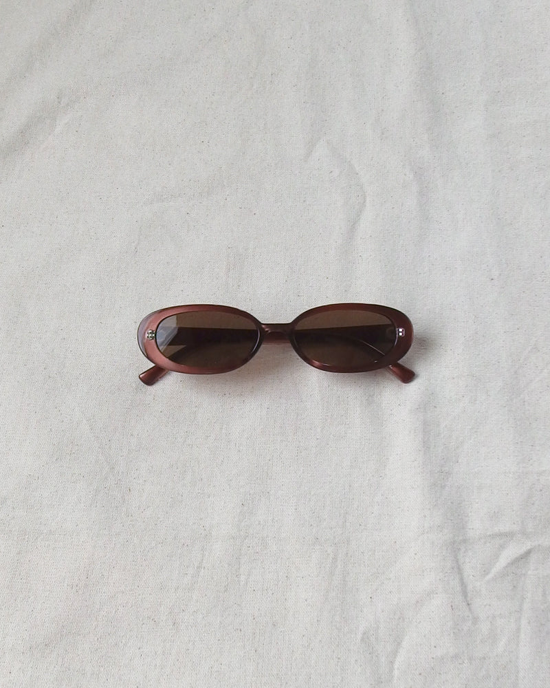 the looking forward oval sunglasses brown frame